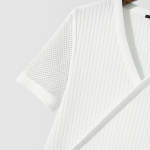 Close-up of a white ribbed V-neck sweater with a mesh short sleeve, displayed on a wooden hanger against a light gray background