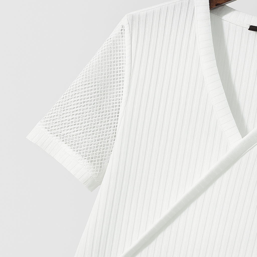 Close-up of a white ribbed V-neck sweater with a mesh short sleeve, displayed on a wooden hanger against a light gray background